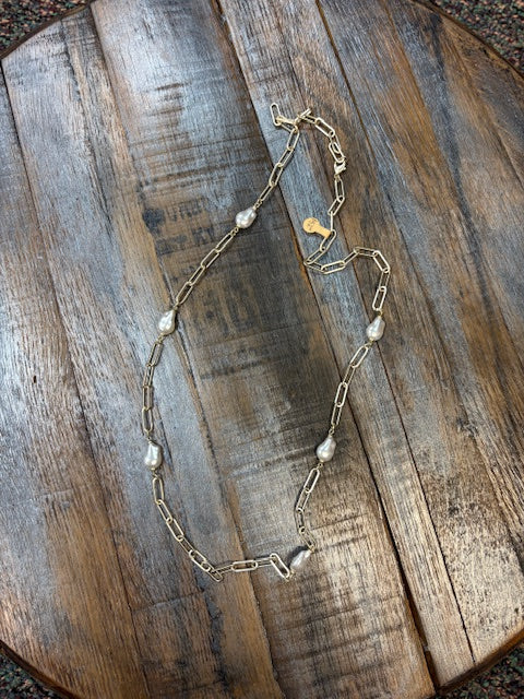 Paper clip long necklace with fresh water pear.