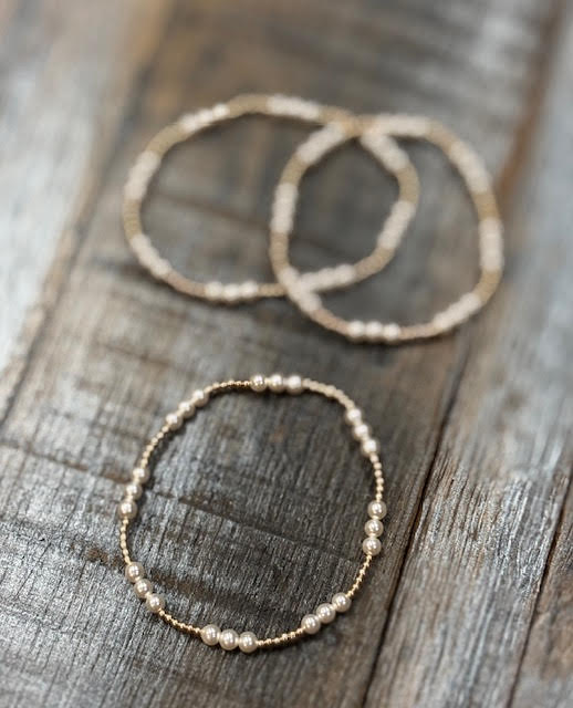 Stackable, stretchy 2mm gold filled and 4mm Mother of Pearl Bracelet